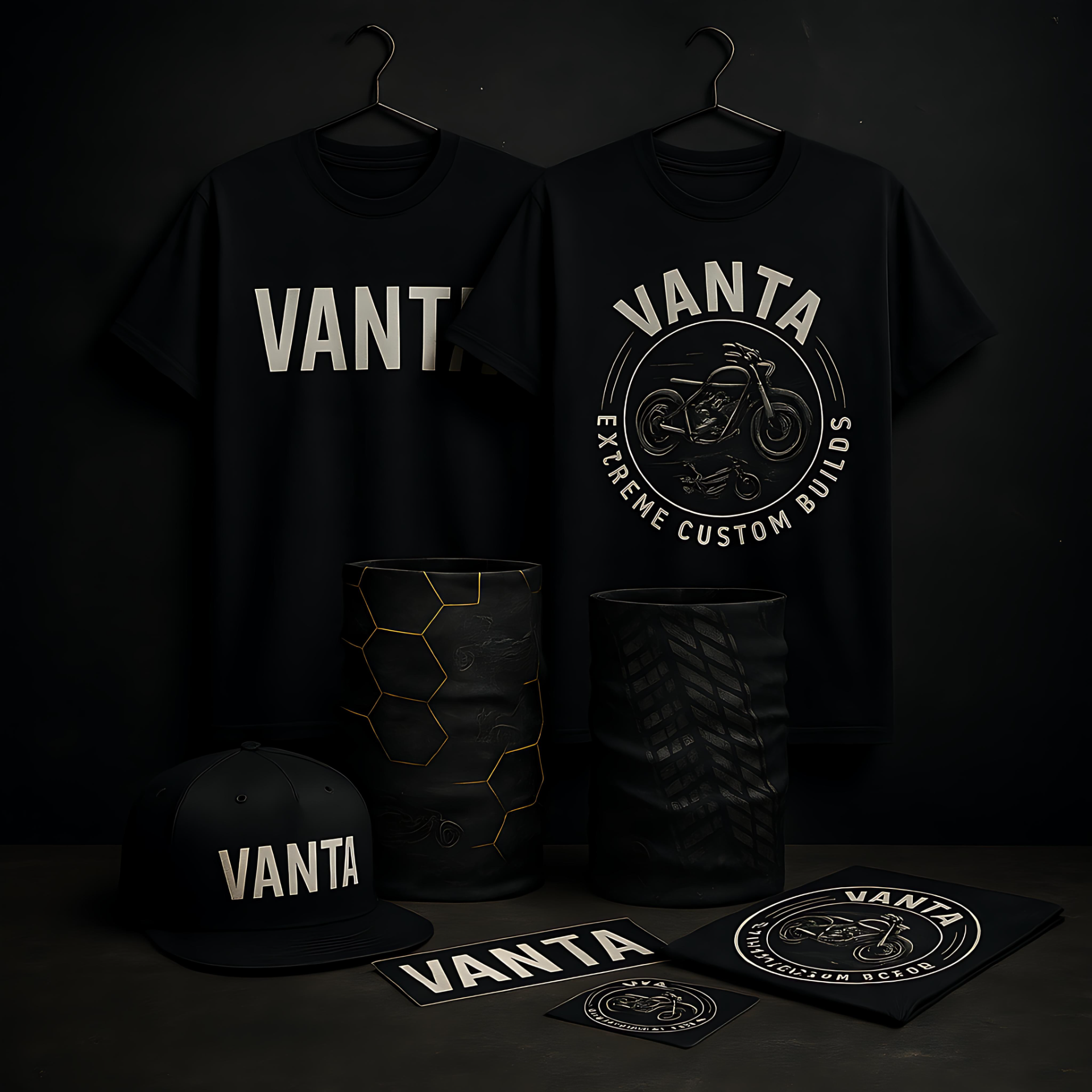Vanta t-shirts, hat, and accessories displayed on a dark background with hex designs.